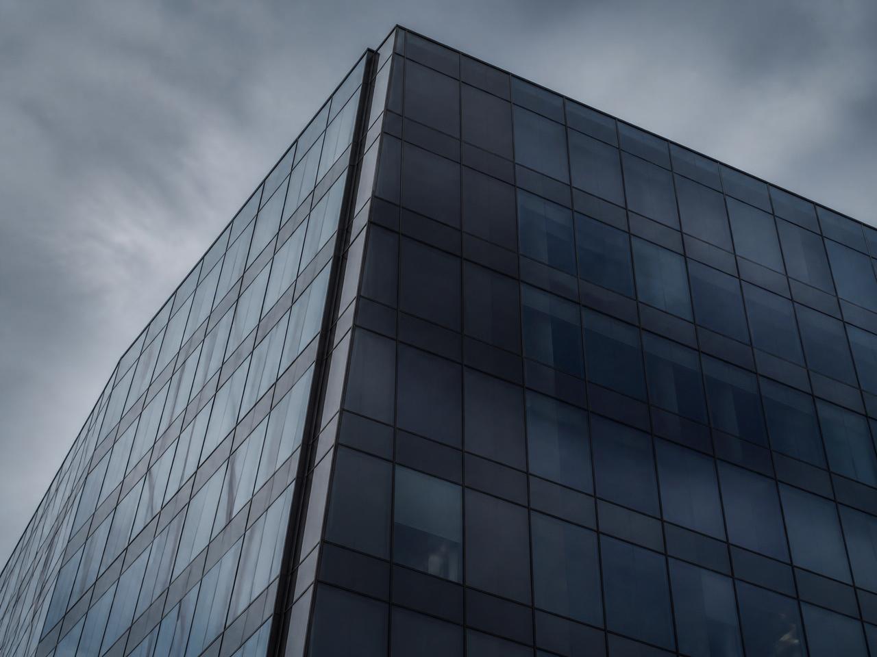 Glass curtain wall of a modern commercial office tower